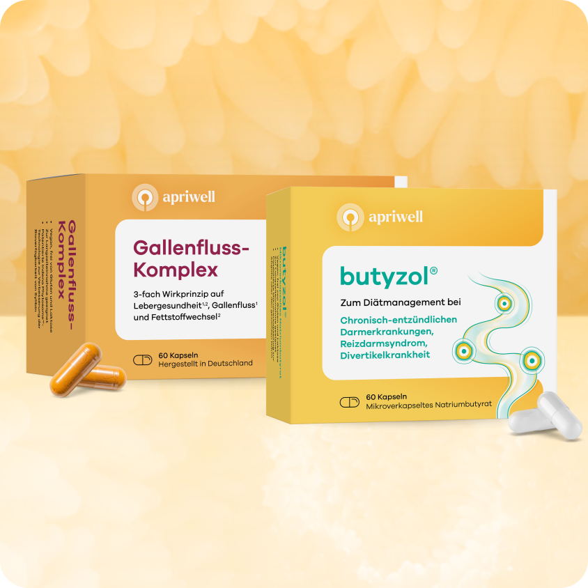 Produktbild – Zwei Produktverpackungen von Apriwell: links die Packung für "Gallenfluss-Komplex" und rechts für "butyrazol®", jeweils mit Kapseln davor.