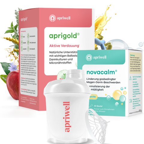 Produktbild – Die Produkte Aprigold und Novacalm von apriwell, daneben ein Mini-Shaker. Daneben sind frische Zutaten wie ein Apfel, Getreideähren und Kräuter abgebildet.